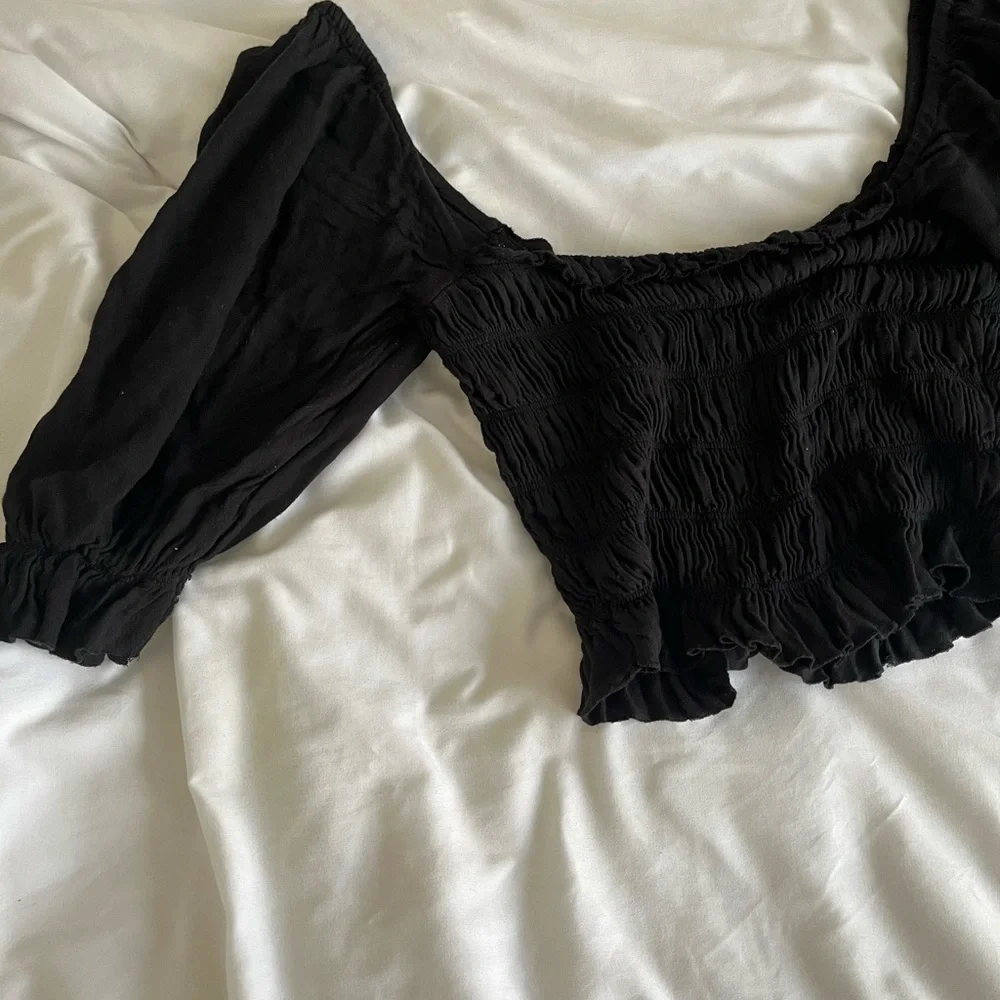 Black urban outfitter top with bell sleeves